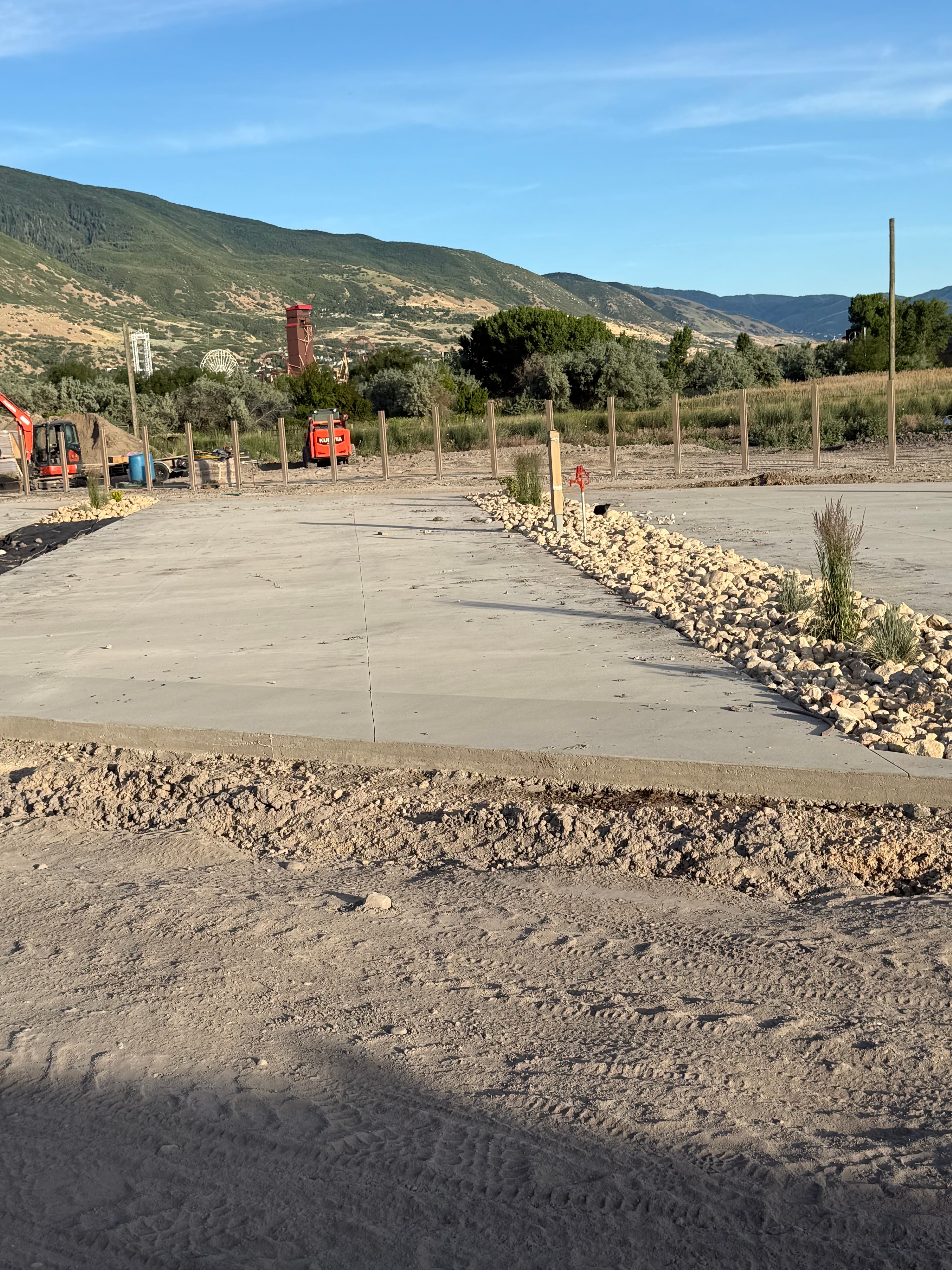 Spring Creek RV Resort construction equipment and concrete work on RV pads