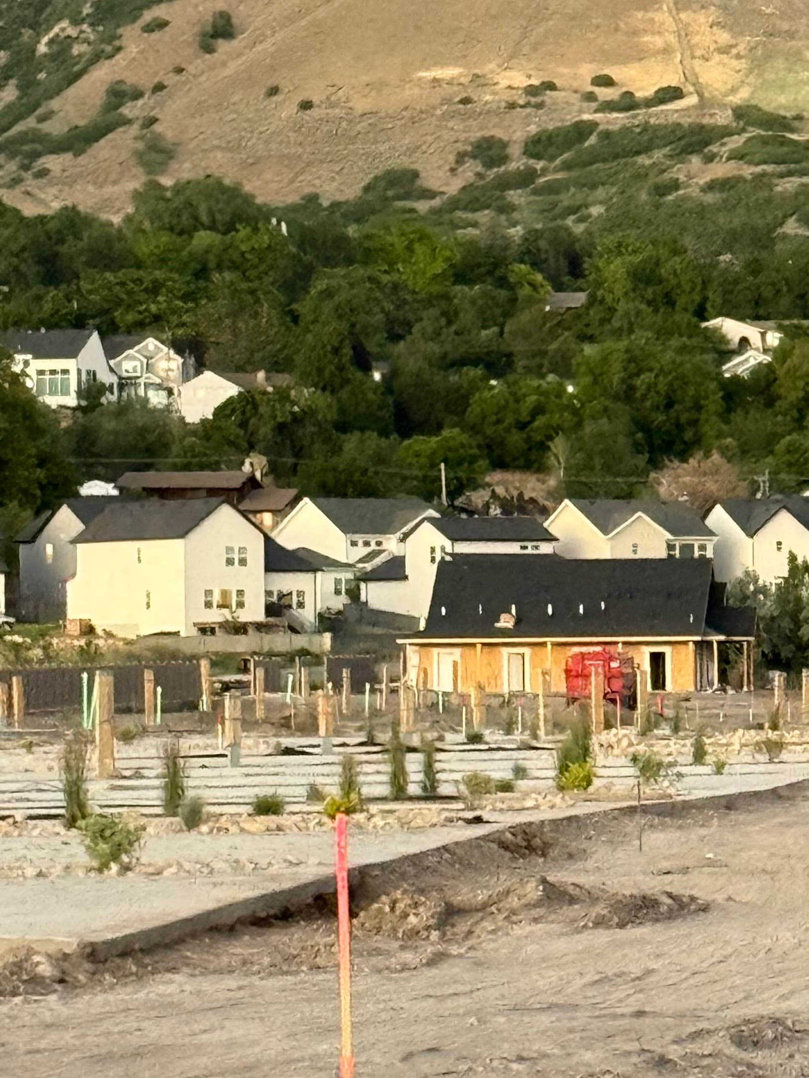 Spring Creek RV Resort concrete pad with finished details and mountain backdrop