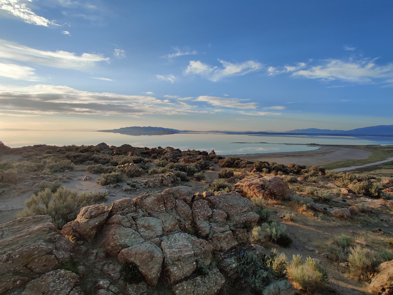 Rocky shoreline of Antelope Island State Park on the Great Salt Lake at sunrise