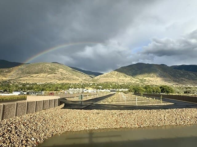 Rainbow over the Wasatch mountains and the RV sites at Spring Creek RV Resort